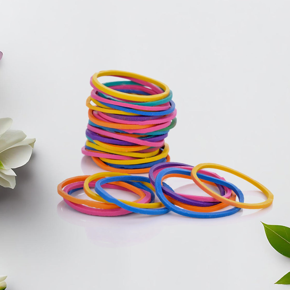 Strong rubber bands keeping computer and headphone cables tidy.